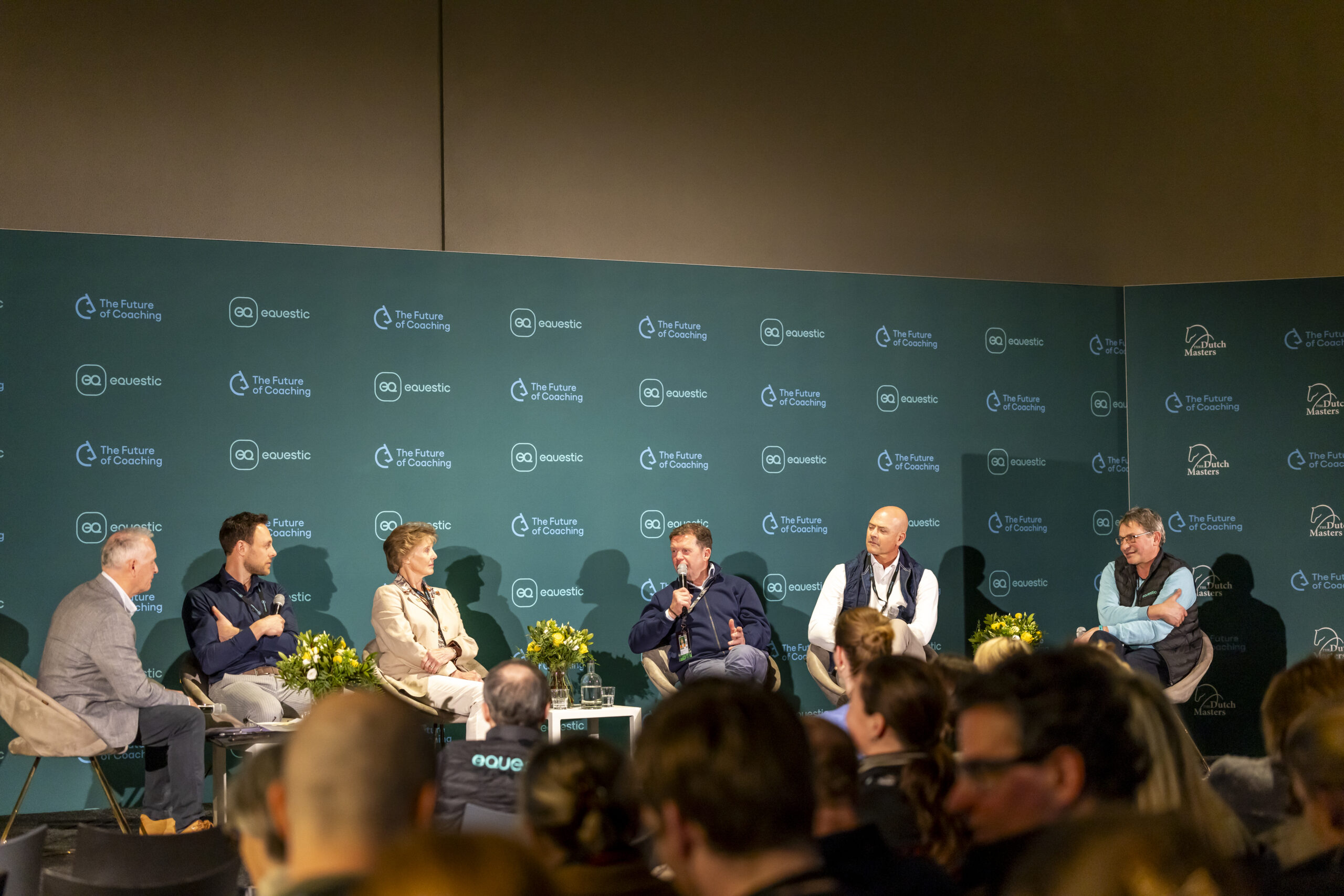 The Future of Coaching Forum panelists at the stage with audience The Dutch Masters 2026